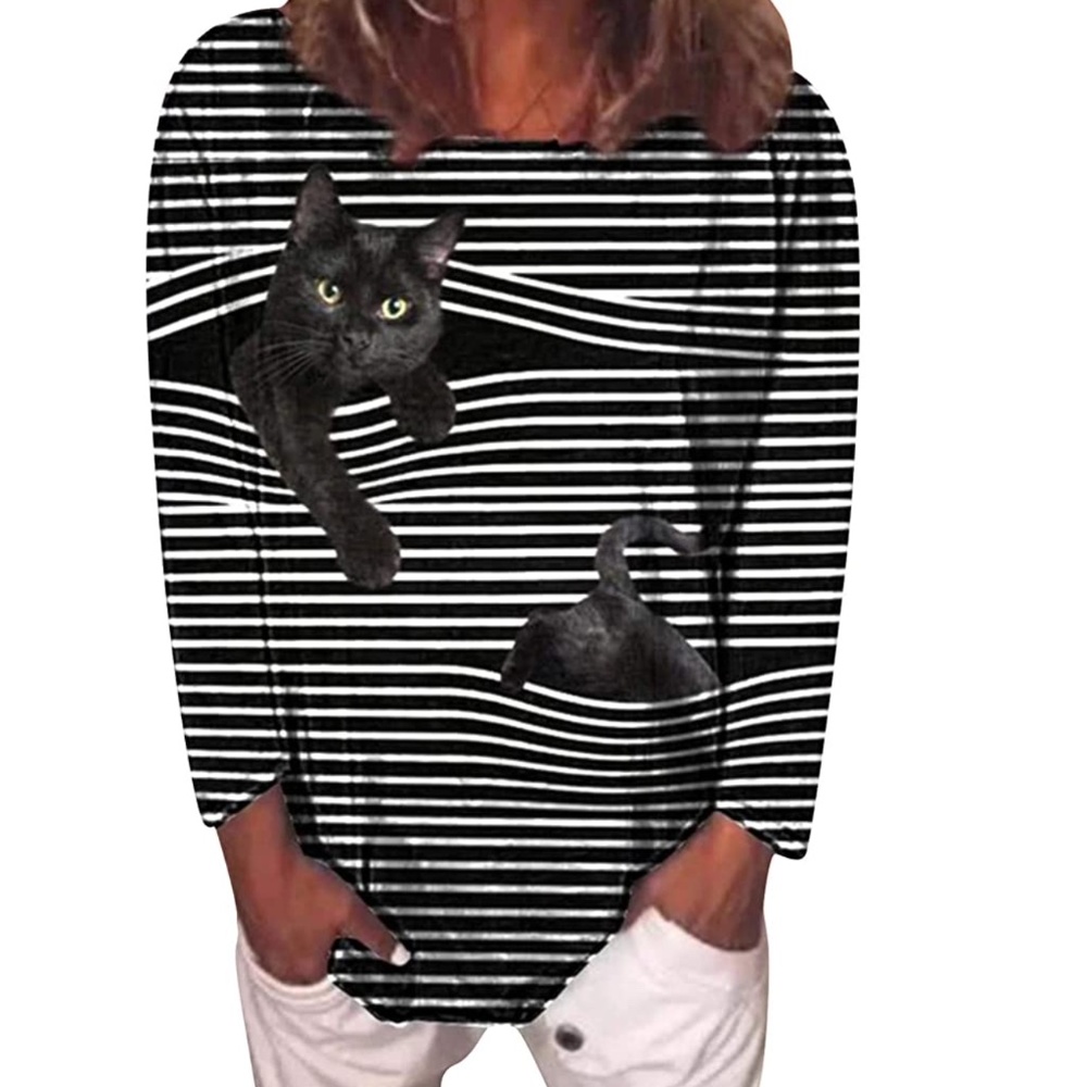 Black and white striped shirt with cat coming out